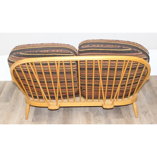 5 - Ercol - a retro 2 seater sofa with mid-century coloured cushions, believed to be a model 203 from th... 