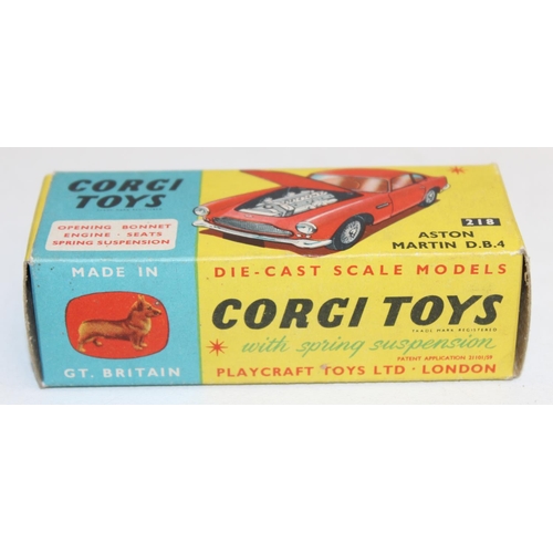 680 - Vintage Corgi Toys Aston Martin D.B.4 (218) diecast scale model in yellow with red interior, with or... 