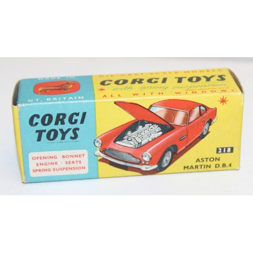 680 - Vintage Corgi Toys Aston Martin D.B.4 (218) diecast scale model in yellow with red interior, with or... 