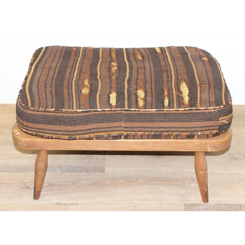 8 - Ercol - a retro footstool with mid-century coloured cushion, believed to be a model 341 from the Win... 