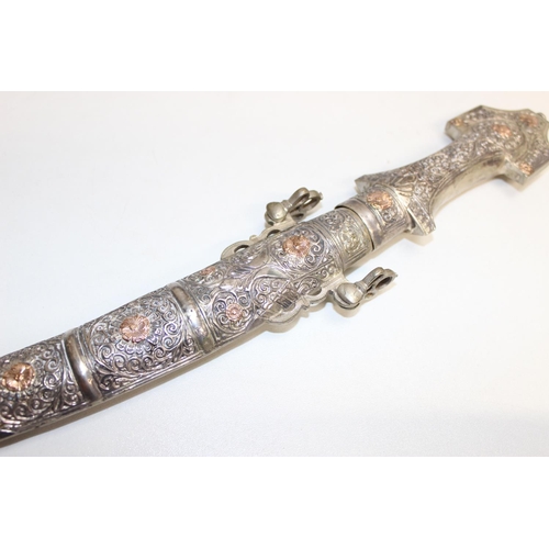 1402 - A vintage Khanjar dagger with silver and gold plated handle and case, a Caucasian Cossak Kinjal dagg... 