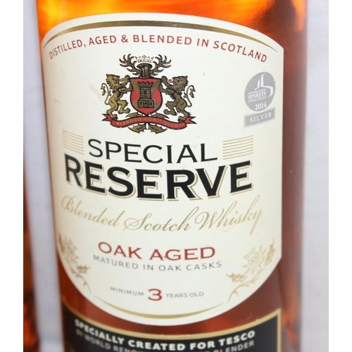 1585 - 2 x 1 litre bottles of oak aged Special Reserve blended Scotch whisky