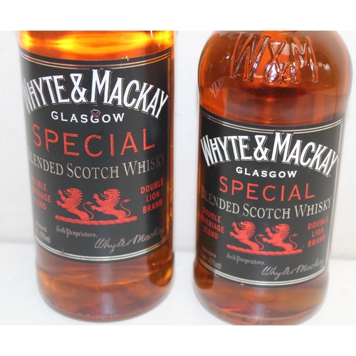 1588 - 2 x bottles of Whyte & Mackay Special blended Scotch whisky (1 litre and 1 x 70cl)