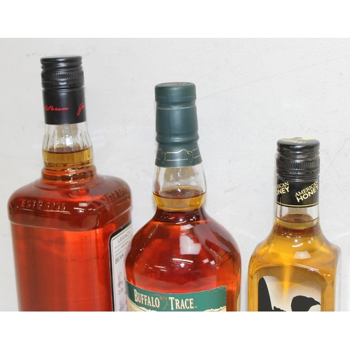 1594 - 3 x bottles of Bourbon to incl 70cl Buffalo Trace, 1 litre Jim Beam and 37.5cl Wild Turkey American ... 