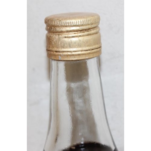 1596 - Vintage bottle of Chapeau Napoleon brandy (24fl oz)