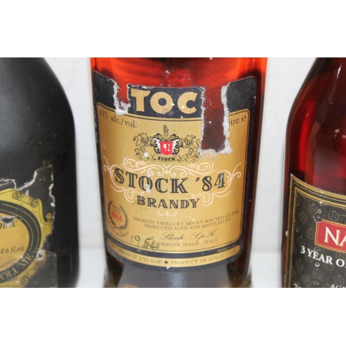 1599 - 3 x bottles of brandy - 1 litre bottle of Stock '84, 70cl XO Superior Napoleon French Brandy, and on... 