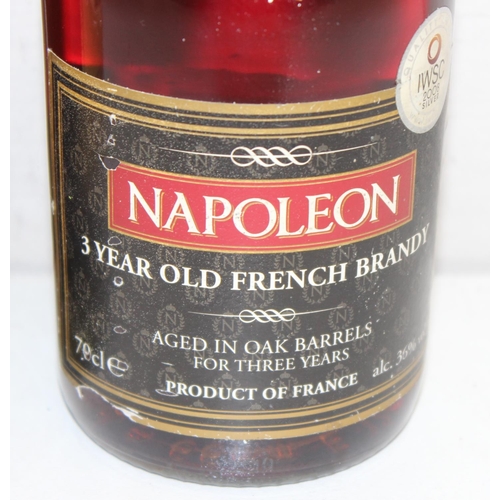 1599 - 3 x bottles of brandy - 1 litre bottle of Stock '84, 70cl XO Superior Napoleon French Brandy, and on... 