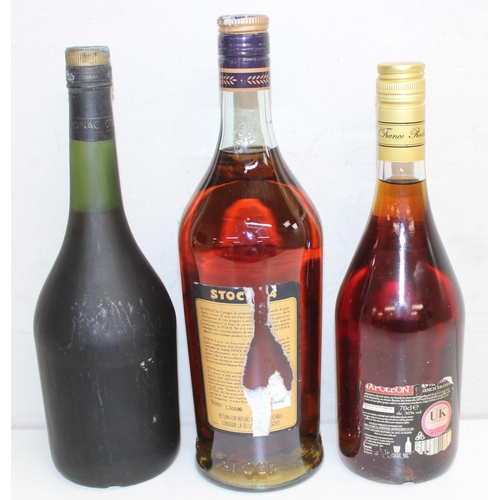 1599 - 3 x bottles of brandy - 1 litre bottle of Stock '84, 70cl XO Superior Napoleon French Brandy, and on... 