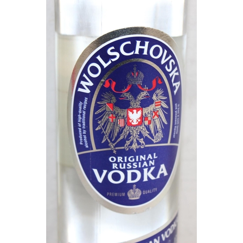 1599C - 3 x bottles of vodka - 2 x 1 Ltr Smirnoff and 1 x 0.7cl Wolschovska vodka