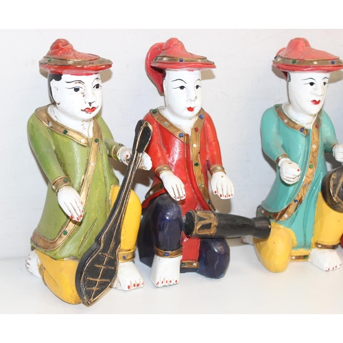 1670 - A set of 6 Oriental carved wooden figures with polychrome decoration, likely a band, the largest app... 