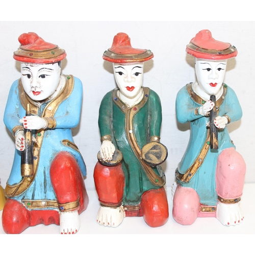 1670 - A set of 6 Oriental carved wooden figures with polychrome decoration, likely a band, the largest app... 