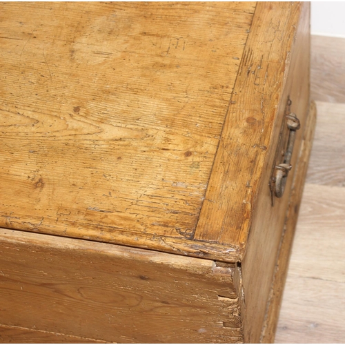 74 - A Victorian pine trunk with wrought iron handles, approx 105cm wide x 47cm deep x 37cm tall