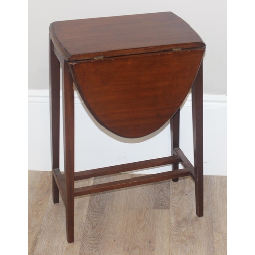 70 - A vintage mahogany nest of 3 tables and a mahogany drop leaf table, the largest of the nest of table... 