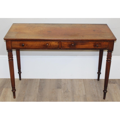 154 - A 19th century mahogany hall table or desk with 2 drawers, turned wooden handles and turned legs, ap... 