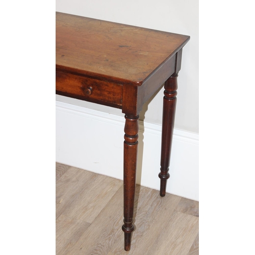 154 - A 19th century mahogany hall table or desk with 2 drawers, turned wooden handles and turned legs, ap... 