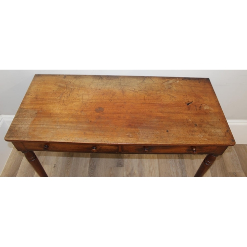 154 - A 19th century mahogany hall table or desk with 2 drawers, turned wooden handles and turned legs, ap... 