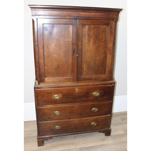 155 - A late 18th or early 19th century oak cabinet on stand, the top 2 door cabinet with 2 shelves, the 3... 