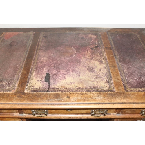 173 - Early 20th century leather-topped 3-part desk with 3 drawers over 8 and brass handles, approx 127cm ... 