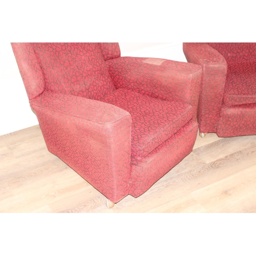 65 - A pair of retro red and black patterned armchairs, seemingly unmarked, approx 83cm tall