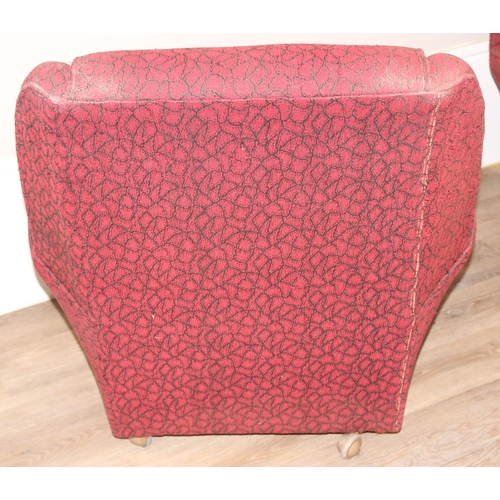 65 - A pair of retro red and black patterned armchairs, seemingly unmarked, approx 83cm tall