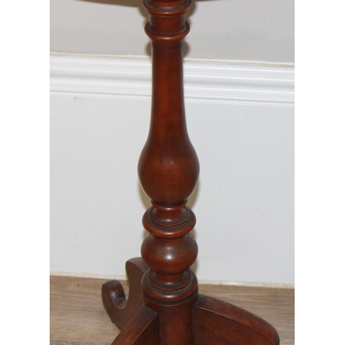 139 - A small antique mahogany wine table with tripod base, approx 48cm in diameter x 72cm tall