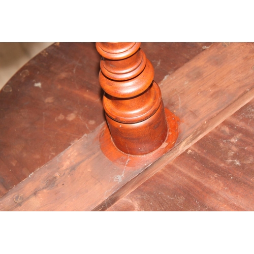 139 - A small antique mahogany wine table with tripod base, approx 48cm in diameter x 72cm tall