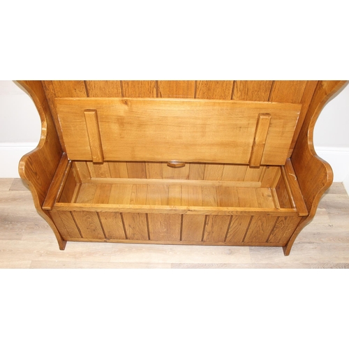 127 - Contemporary high quality light oak high-backed settle bench by Bates & Lambourne, dated 1998, appro... 