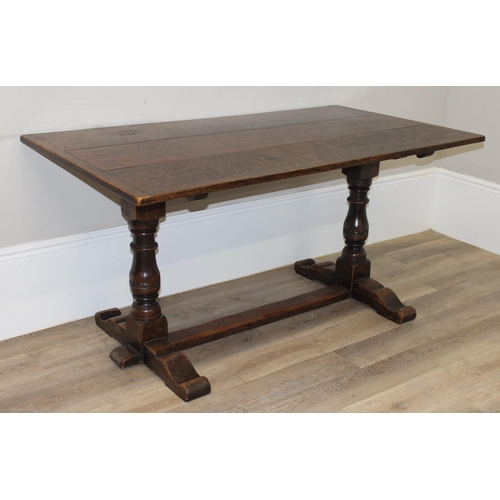 141 - An antique style oak refectory table on turned legs, approx 150cm x 83cm x 75cm