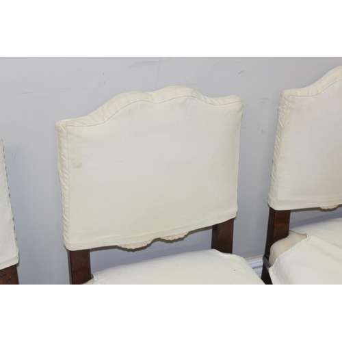 115 - 4 oak dining chairs with cream coverings, Carolean style