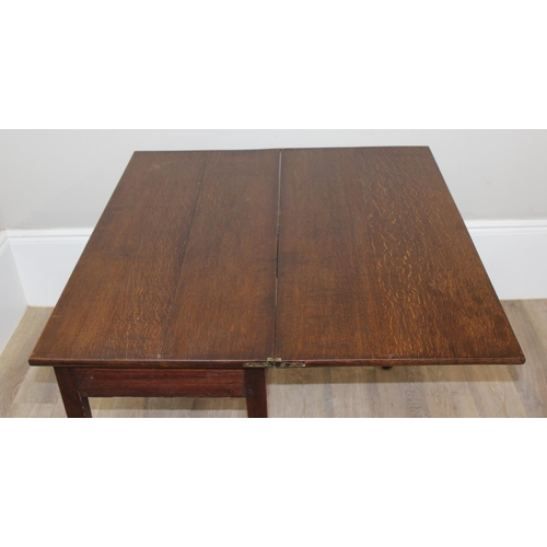 142 - Georgian oak tea table with lift-over top and single drawer, approx 96cm x 96cm x 72cm