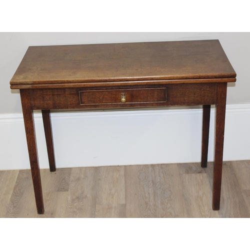 142 - Georgian oak tea table with lift-over top and single drawer, approx 96cm x 96cm x 72cm