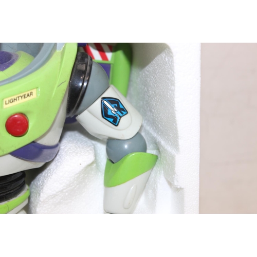 690 - A vintage Buzz Lightyear from Toy Story talking figure, in original box, the box approx 34cm tall