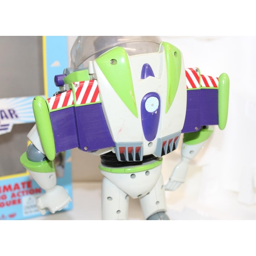 690 - A vintage Buzz Lightyear from Toy Story talking figure, in original box, the box approx 34cm tall