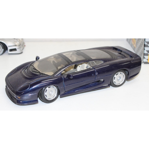 691 - Qty of assorted Maisto model cars to inc a boxed Porsche 911 GT1 LE Mans 1998, mainly 1/18 or 1/24 s... 