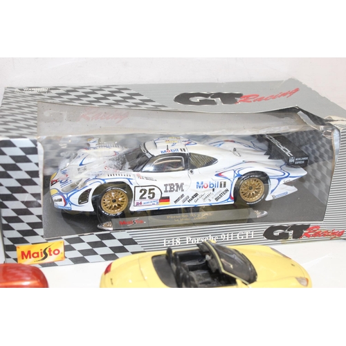 691 - Qty of assorted Maisto model cars to inc a boxed Porsche 911 GT1 LE Mans 1998, mainly 1/18 or 1/24 s... 