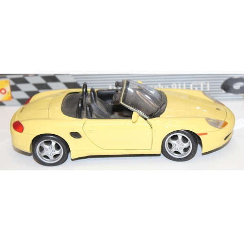 691 - Qty of assorted Maisto model cars to inc a boxed Porsche 911 GT1 LE Mans 1998, mainly 1/18 or 1/24 s... 