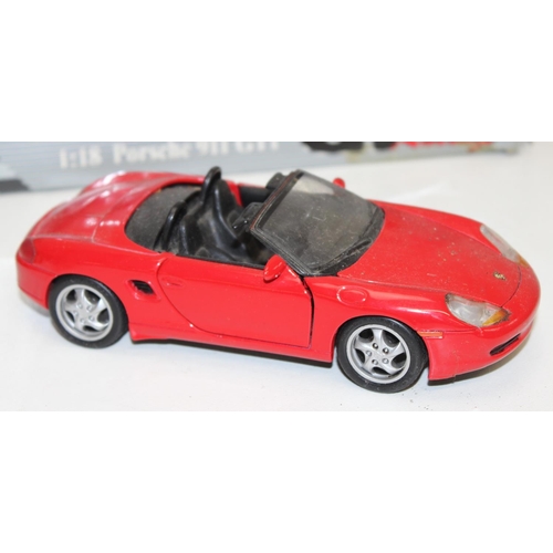 691 - Qty of assorted Maisto model cars to inc a boxed Porsche 911 GT1 LE Mans 1998, mainly 1/18 or 1/24 s... 