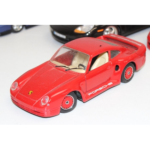 692 - Qty of assorted Burago model cars to inc Ferrari, Porsche etc, mainly 1/18th and 1/24th scale (13)