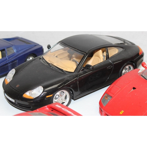 692 - Qty of assorted Burago model cars to inc Ferrari, Porsche etc, mainly 1/18th and 1/24th scale (13)