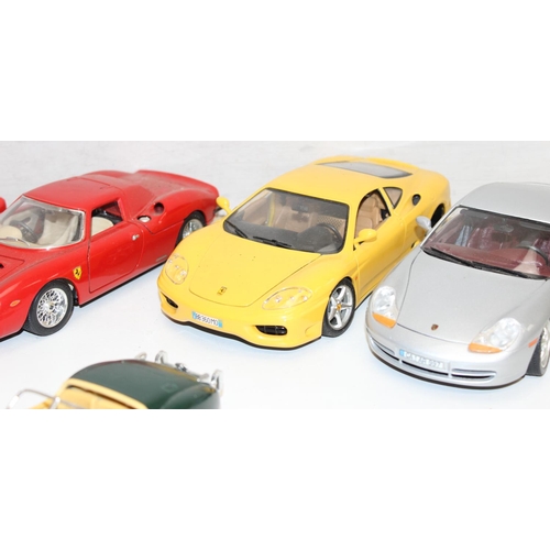 692 - Qty of assorted Burago model cars to inc Ferrari, Porsche etc, mainly 1/18th and 1/24th scale (13)