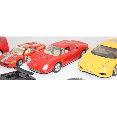 692 - Qty of assorted Burago model cars to inc Ferrari, Porsche etc, mainly 1/18th and 1/24th scale (13)