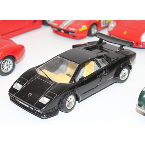 692 - Qty of assorted Burago model cars to inc Ferrari, Porsche etc, mainly 1/18th and 1/24th scale (13)