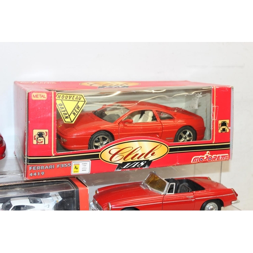 693 - Qty of assorted model toy cars to inc a boxed Majorette 1/18 Ferrari F355, Corgi MGB & MGF, and othe... 