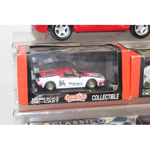 693 - Qty of assorted model toy cars to inc a boxed Majorette 1/18 Ferrari F355, Corgi MGB & MGF, and othe... 