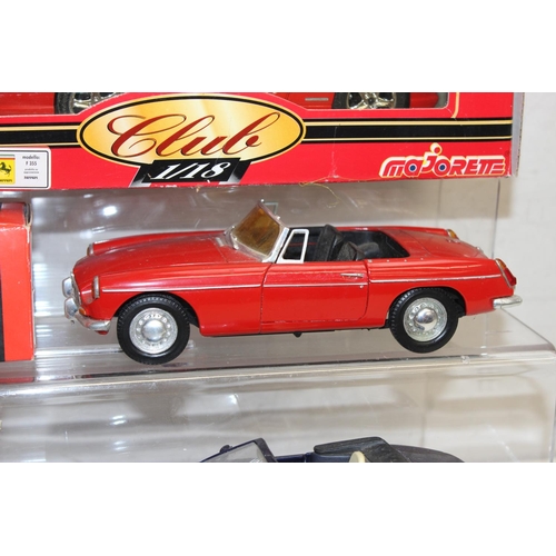 693 - Qty of assorted model toy cars to inc a boxed Majorette 1/18 Ferrari F355, Corgi MGB & MGF, and othe... 