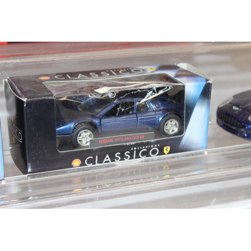 693 - Qty of assorted model toy cars to inc a boxed Majorette 1/18 Ferrari F355, Corgi MGB & MGF, and othe... 