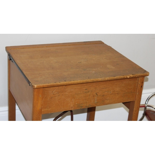 695 - Vintage pine children's school desk, with a push-along dog stuffed dog, tin-plate tricycle and ride ... 