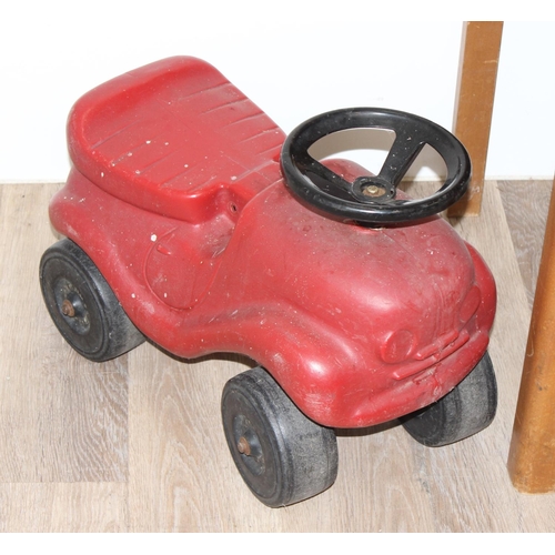 695 - Vintage pine children's school desk, with a push-along dog stuffed dog, tin-plate tricycle and ride ... 