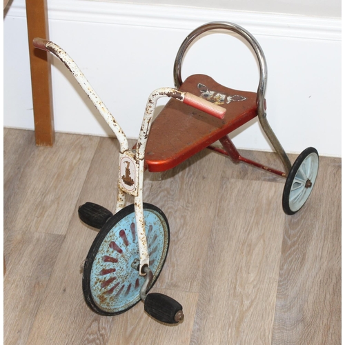 695 - Vintage pine children's school desk, with a push-along dog stuffed dog, tin-plate tricycle and ride ... 