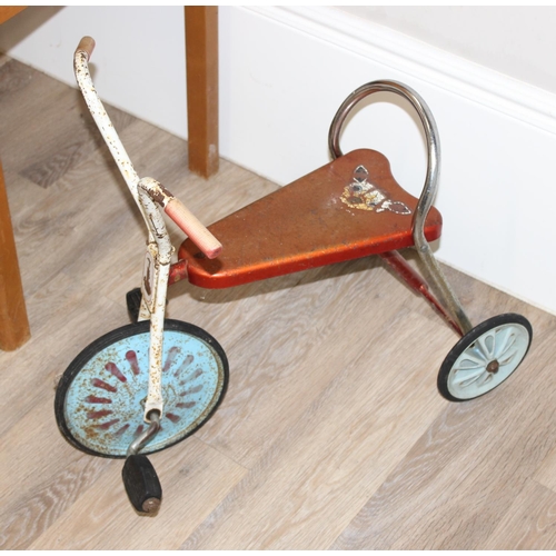 695 - Vintage pine children's school desk, with a push-along dog stuffed dog, tin-plate tricycle and ride ... 